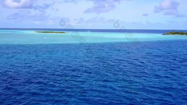 宽角风景海洋度假胜地海滩假期蓝色的绿色环礁湖明亮的沙子背景度假胜地
